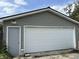Detached garage with double door and side door at 353 S Washington St, Clinton, IN 47842