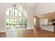 Spacious living room with hardwood floors and large windows offering natural light at 3657 Sycamore Bend S Way, Columbus, IN 47203