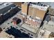 Aerial perspective of a city block with buildings and a vacant lot at 111 S Meridian St # 2, Indianapolis, IN 46225