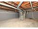 Unfinished basement with HVAC and plumbing at 2035 N Tibbs Ave, Indianapolis, IN 46222
