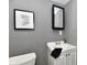 Clean bathroom, with vanity, toilet and mirror at 2035 N Tibbs Ave, Indianapolis, IN 46222