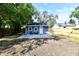 Newly constructed home with small backyard and patio at 2035 N Tibbs Ave, Indianapolis, IN 46222