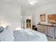 Bright bedroom with dresser and view to dining area at 6517 Emerald Hill Ct # Apt 312, Indianapolis, IN 46237