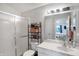 Clean bathroom with shower, toilet, vanity, and storage at 6517 Emerald Hill Ct # Apt 312, Indianapolis, IN 46237