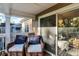 Relaxing apartment balcony with wicker chairs and wooded views at 6517 Emerald Hill Ct # Apt 312, Indianapolis, IN 46237