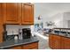 Kitchen with coffee bar and view into living room at 6517 Emerald Hill Ct # Apt 312, Indianapolis, IN 46237