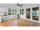 Kitchen breakfast nook with hardwood floors and access to the backyard at 8954 Briarclift Rd, Indianapolis, IN 46256