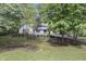 Two-story house with stone accents and landscaped yard at 8954 Briarclift Rd, Indianapolis, IN 46256