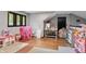 Playroom with toys, desk, and hardwood floor at 8954 Briarclift Rd, Indianapolis, IN 46256