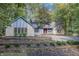 Two-story home with stone and wood siding at 8954 Briarclift Rd, Indianapolis, IN 46256