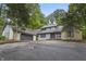 Two-story home with attached garage and stone accents at 8954 Briarclift Rd, Indianapolis, IN 46256