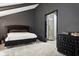 Elegant main bedroom with plush bed, en-suite bathroom, and access to patio at 8954 Briarclift Rd, Indianapolis, IN 46256