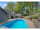 House with a inground pool and large backyard at 8954 Briarclift Rd, Indianapolis, IN 46256