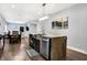 Kitchen features a large island with butcher block countertop and stainless steel sink at 6129 Crittenden Ave, Indianapolis, IN 46220
