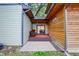 Backyard with a wooden deck and patio at 6129 Crittenden Ave, Indianapolis, IN 46220