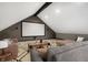 Relax in this finished basement home theater, featuring a large projection screen and comfortable seating at 6129 Crittenden Ave, Indianapolis, IN 46220