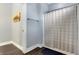 Suburban bathroom with shower and gray walls at 6129 Crittenden Ave, Indianapolis, IN 46220