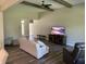 Spacious living room featuring hardwood floors and a neutral color palette at 1230 Thorndon Ct, Danville, IN 46122