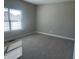 Spacious bedroom with carpeted floor and window with blinds at 1230 Thorndon Ct, Danville, IN 46122