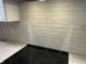 Sleek kitchen with white cabinets and a contemporary glass cooktop at 1230 Thorndon Ct, Danville, IN 46122