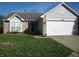 Brick ranch house with a two-car garage at 5347 Waterton Lakes Dr, Indianapolis, IN 46237