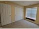 Spacious bedroom with double closets and a window seat at 5347 Waterton Lakes Dr, Indianapolis, IN 46237