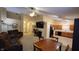 Living room with fireplace and access to kitchen at 5347 Waterton Lakes Dr, Indianapolis, IN 46237