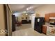 Open kitchen with view of living room and dining area at 5347 Waterton Lakes Dr, Indianapolis, IN 46237