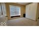Bedroom with double closets and a window seat at 5347 Waterton Lakes Dr, Indianapolis, IN 46237