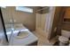 Bathroom with double vanity, tub and shower at 5347 Waterton Lakes Dr, Indianapolis, IN 46237