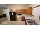 Kitchen with wood cabinets, and stainless steel appliances at 5347 Waterton Lakes Dr, Indianapolis, IN 46237