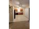 Kitchen with wood cabinets, tile floor, and appliances at 5347 Waterton Lakes Dr, Indianapolis, IN 46237
