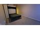 Bedroom with wall-mounted bed and mirrored closet at 5347 Waterton Lakes Dr, Indianapolis, IN 46237