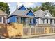 Blue house with white door and black accents at 1526 Lawton Ave, Indianapolis, IN 46203