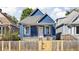Blue house with white door and black accents at 1526 Lawton Ave, Indianapolis, IN 46203