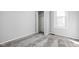 Spacious bedroom with gray walls and gray carpeting at 1526 Lawton Ave, Indianapolis, IN 46203