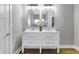 Elegant bathroom with double vanity and modern fixtures at 515 Orange St, Indianapolis, IN 46203