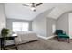 Serene bedroom with vaulted ceiling, and private access to balcony at 515 Orange St, Indianapolis, IN 46203