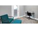 Cozy home office with teal armchair and desk at 515 Orange St, Indianapolis, IN 46203