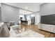 Open living room with hardwood floors and comfortable seating at 515 Orange St, Indianapolis, IN 46203