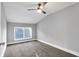 Simple bedroom with grey walls and carpet flooring at 515 Orange St, Indianapolis, IN 46203