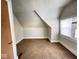 Simple bedroom with neutral walls and brown carpet at 712 W Queen St, Muncie, IN 47303