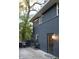 Dark brick exterior with a patio and landscaping at 6205 Bramshaw Rd, Indianapolis, IN 46220