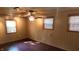 Hardwood floor bedroom with neutral colored walls and window blinds at 6205 Bramshaw Rd, Indianapolis, IN 46220