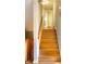 Wooden staircase leading to the second floor at 6205 Bramshaw Rd, Indianapolis, IN 46220