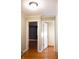 Bright hallway with doors to bedrooms at 6205 Bramshaw Rd, Indianapolis, IN 46220