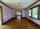Elegant dining room, hardwood floors, and access to other rooms at 548 Central N Ct, Indianapolis, IN 46205