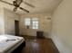 Bedroom with hardwood floors, a window, and a mattress at 548 Central N Ct, Indianapolis, IN 46205