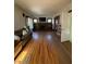 Spacious living room featuring hardwood floors and a fireplace at 548 Central N Ct, Indianapolis, IN 46205