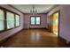 Bright dining room with hardwood floors and a chandelier at 548 Central N Ct, Indianapolis, IN 46205